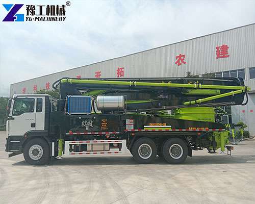 diesel concrete boom pump on remote construction site