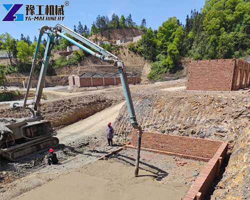 small concrete pump truck on construction site