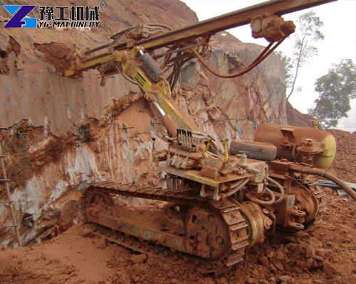 crawler drill rig in hard rock terrain