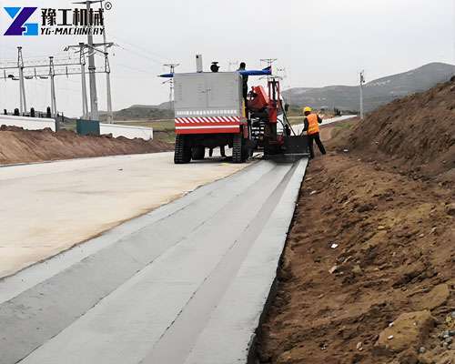 curb and gutter machine in highway shoulder construction