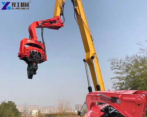 Excavator-mounted vibratory hammer for pile driving
