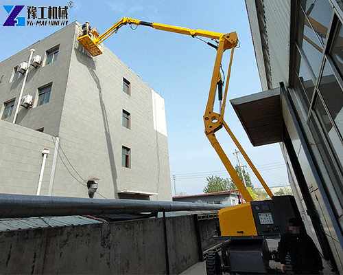Compact articulating boom lift for elevated work in restricted access areas