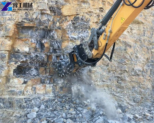 Drum cutter milling concrete with an excavator