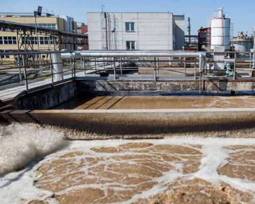 Accumulated sludge at the bottom of an industrial sedimentation tank